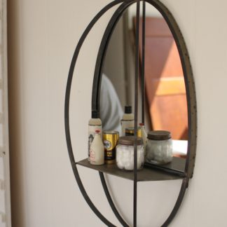 oval mirror with shelf