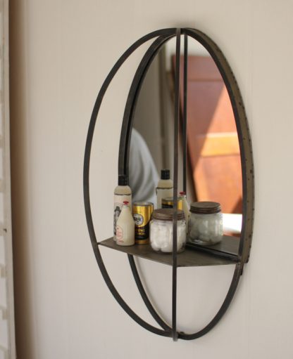oval mirror with shelf