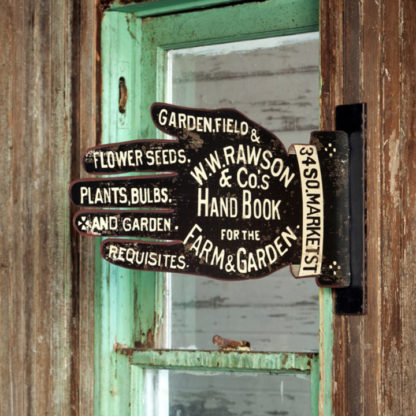 vintage metal garden supply shop sign