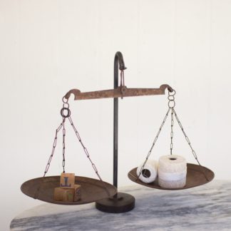 antique metal scale with weighted base