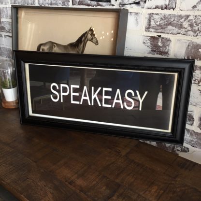 SPEAKEASY Framed Print